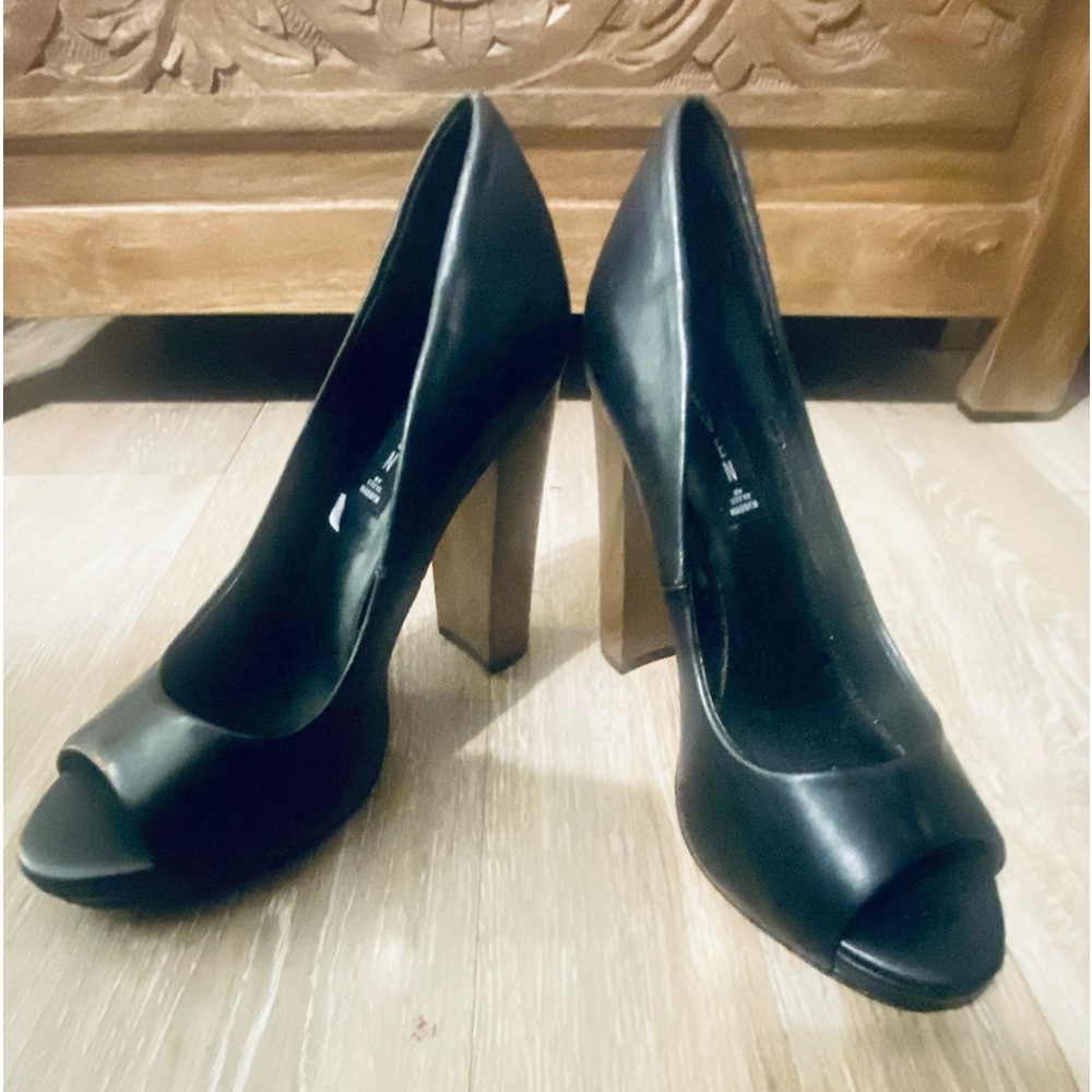 Steven by Steve Madden black leather size 7 1/2 peep-toe heels worn once.